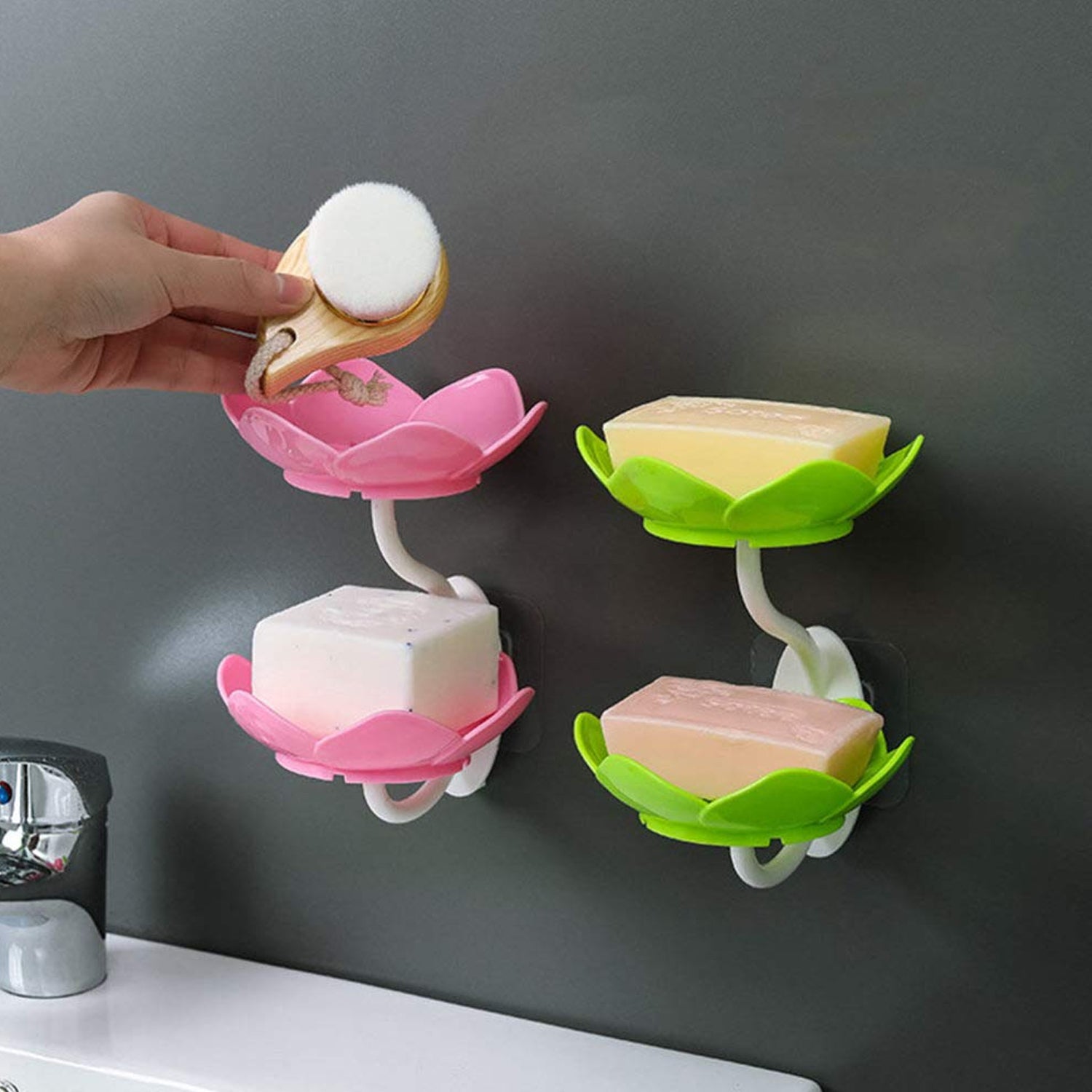 Flower-shaped self-draining soap dish holder for bathroom or kitchen use. Flower-shaped self-draining soap dish holder for bathroom or kitchen use.